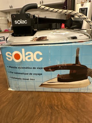 Plancha de viaje Solac automática