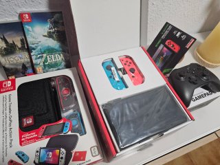Nintendo Switch OLED + 2 Juegos + Accesorios