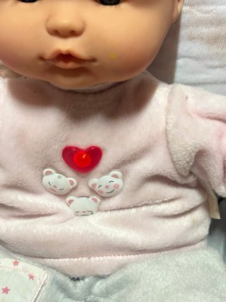 Muñeco bebé interactivo en varios idiomas