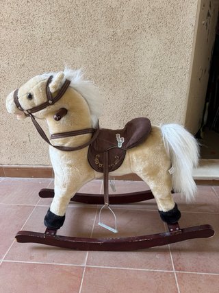 Caballito balancín peluche