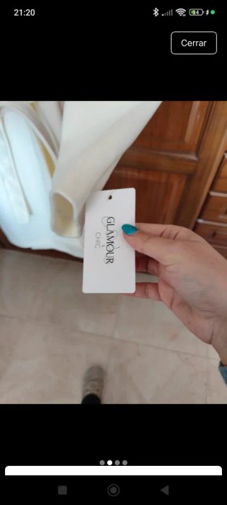 Abrigo crema con cuello de pelo