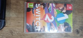 Nintendo Switch Gris y Negro + Juego y Mando.