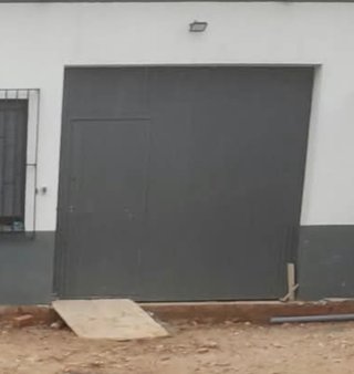 Puerta de garaje gris corredera