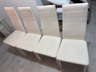 Sillas de piel blancas