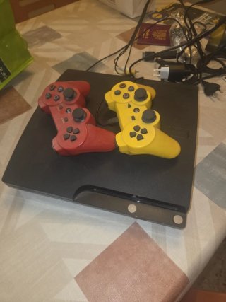 Consola PlayStation 3 con 2 mandos