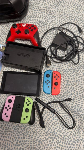 Nintendo Switch + Accesorios y Juegos