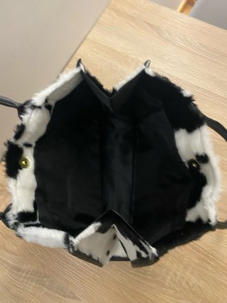 Bolso de pelo blanco y negro