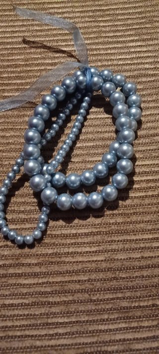 Pulseras de perlas celestes