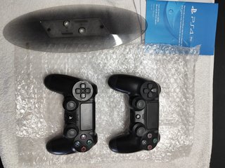 PS4 Pro 1TB Casi Sin Usar + Accesorios