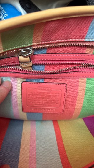 Cartera coach de mujer