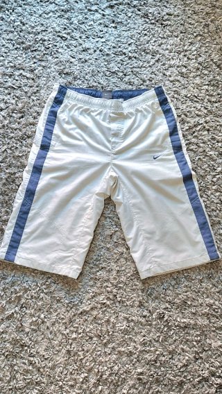Pantaloncini Nike bianchi con banda blu