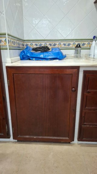 9 Puertas de madera y 4 cajones con sus premarcos