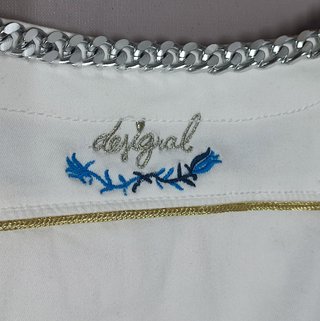 Biker. Chaqueta blanca de Desigual. Talla L