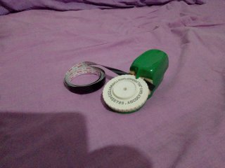 Etichettatrice verde con nastro