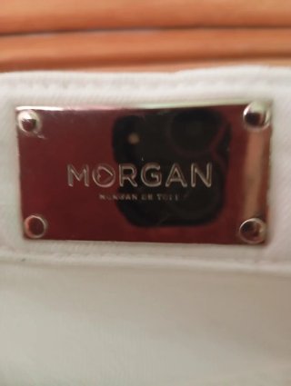 Pantalones Morgan blancos con detalles