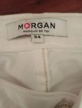 Pantalones Morgan blancos con detalles