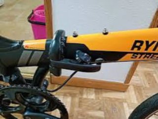 Bicicleta plegable RYME STREET y candado.