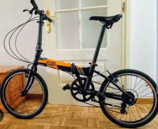 Bicicleta plegable RYME STREET y candado.