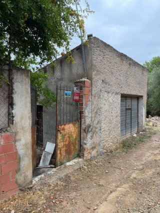 Terreno rustico con casa a reformar