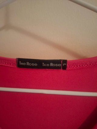 Camiseta sin mangas rosa V-neck