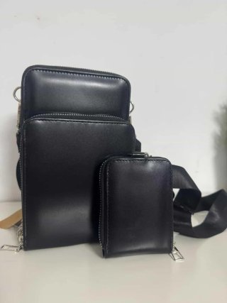 Bolso negro con cremallera