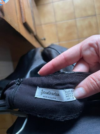 Minigonna nera ecopelle a portafoglio