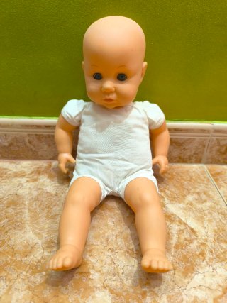 Muñeco bebé adorable que dice mamá llora y se ríe