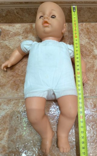 Muñeco bebé adorable que dice mamá llora y se ríe