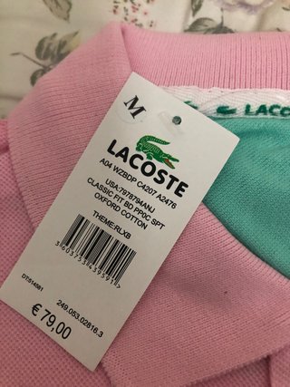 Polo Lacoste Rosa Talla M y otro Blanco Talla M