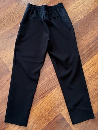 Pantalones negros mujer con botones dorados