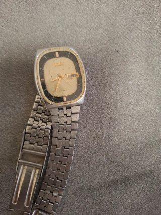 Reloj Citizen Automático Dorado y Plateado