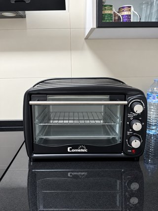 Horno portátil Comelec negro