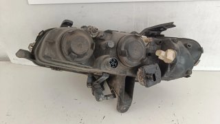 Farol Opel Omega B 2000