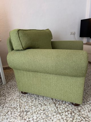 Sillón verde de tela
