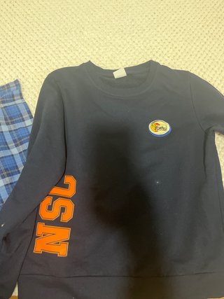 Sudadera azul con logo y letras NSC S Falda NSC S