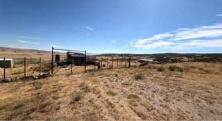 PARCELA 1.000 m² + CASA DE MADERA | VISTAS AL EM