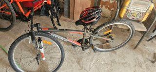 Bicicleta B'TWIN Naranja Montaña y bici rockrider