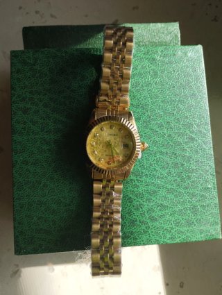 Orologio dorato day date