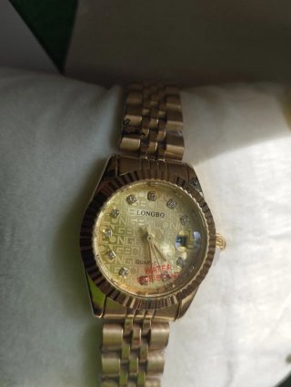 Orologio dorato day date