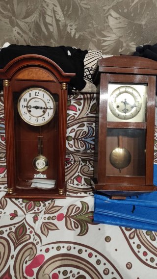 Orologi a pendolo in legno