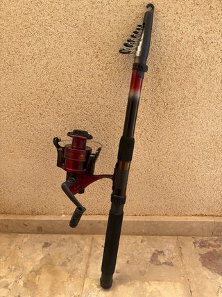 Caña de pescar con carrete