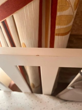 Cuna de madera con colchón