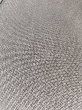 Sillón de tela gris