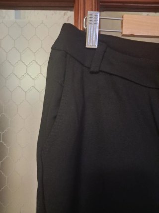 Pantaloni donna neri a zampa