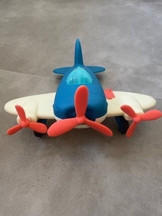 Avión de juguete azul y blanco