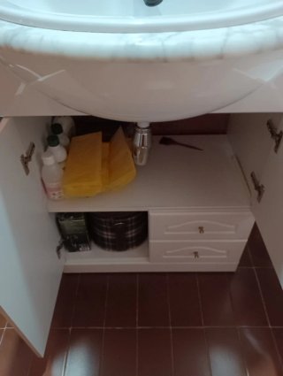 Mueble de baño con lavabo de mármol