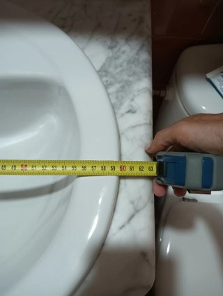 Mueble de baño con lavabo de mármol