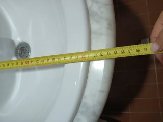 Mueble de baño con lavabo de mármol
