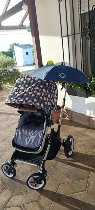 Silla con dos capotas y capazo Bugaboo Fox.