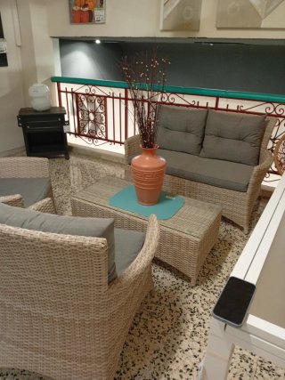 Conjunto terraza mimbre y tela